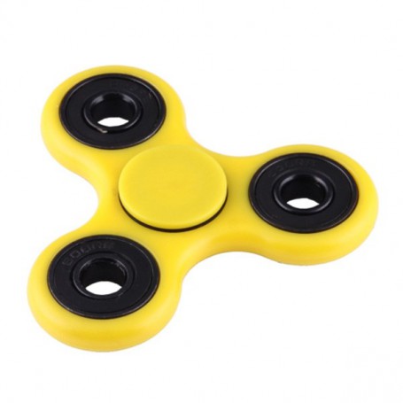 Keltainen Fidget Spinner.