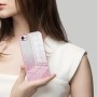 iPhone SE 2022 pinkki glitter suojakuori kädessä