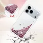 Lähikuva: iPhone 17 Pro pinkki glitter hile suojakuori ja hilehiukkaset valossa.
