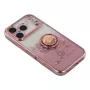 Lähikuva: iPhone 17 Pro ruusukulta glitter kukka sormuspidike suojakuori ja ruusukullan sävyiset yksityiskohdat.