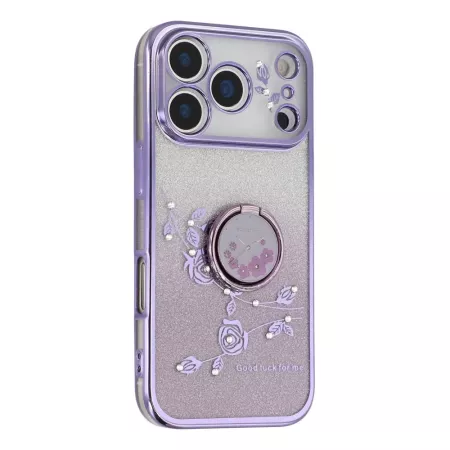 iPhone 17 Pro Max violetti glitter kukka sormuspidike suojakuori viistosta; kimalteleva tausta ja kohokuvioidut kukat.