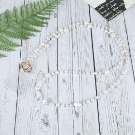 Helmikoristeinen puhelimen kaula- ja olkahihna.