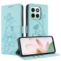 Honor 600 Smart 5G suojakotelon sisäpuolella on kolme korttipaikkaa