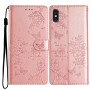 Ruusukultainen iPhone X/Xs suojakotelo kulkee kätevästi mukana rannelenkin ansiosta.