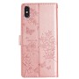 Ruusukultainen iPhone X/Xs suojakotelo erottuu kukka ja perhoskuvioinnillaan.