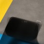 OnePlus 13R privacy panssarilasin tumma pinta rajoittaa sivulta näkyvää sisältöä.