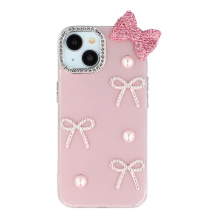 iPhone 14 kuoren koristeelliset rusetit ja pinkki rusetti viimeistelevät puhelimen ilmeen.