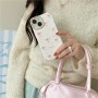 iPhone 14 kuoren pinkit rusetit tuovat puhelimeen raikkaan ja leikkisän ilmeen.