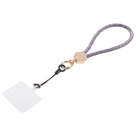 Violetti strassikoristeinen rannelenkki helpottaa puhelimen kantamista.